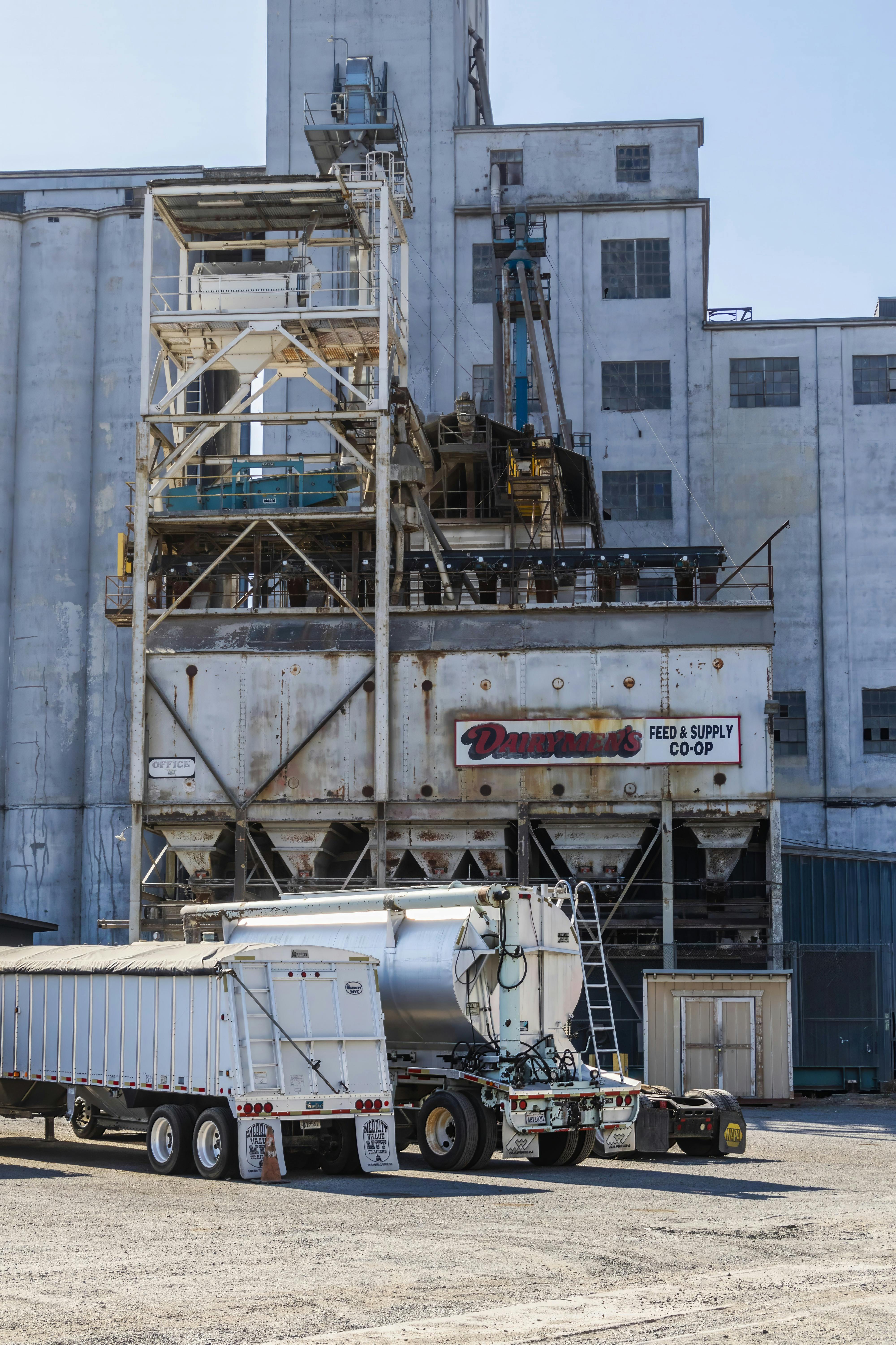 Truck and trailer at an industrial warehouse facility